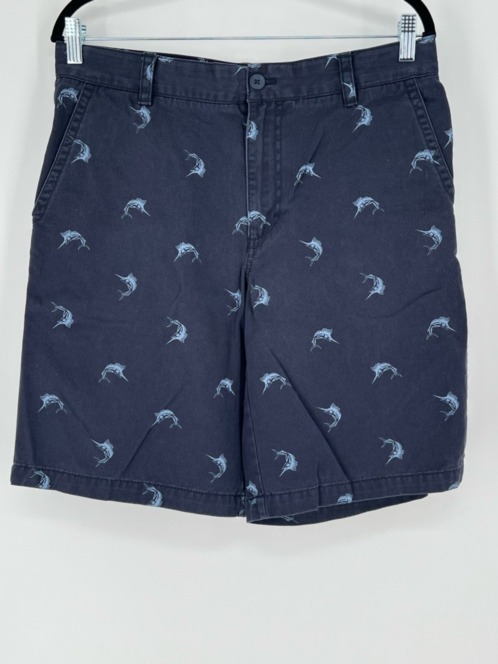 IZOD men's navy‎ blue shorts featuring a sailfish print